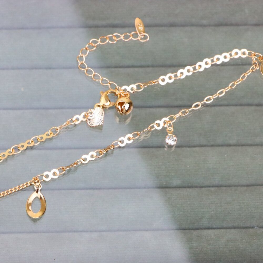 "Rose Gold Anklet with Hollow Charms and Bell, Elegant Chain Design, XPAL1062